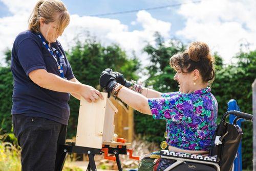 RSPCA volunteer making a bird nest.